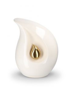 Urna funerária em forma de gota de cerâmica branca com pequena gota dourada