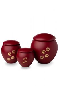 Urna de animais vermelha com patas